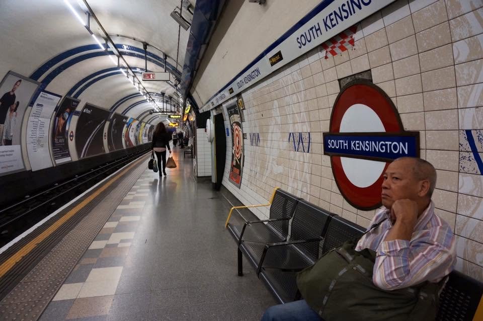 My dad and South Kensington Station, one of the underground stations in London.