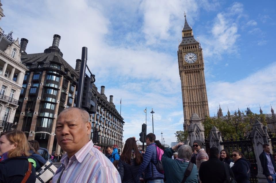 My dad with Big Ben in London.